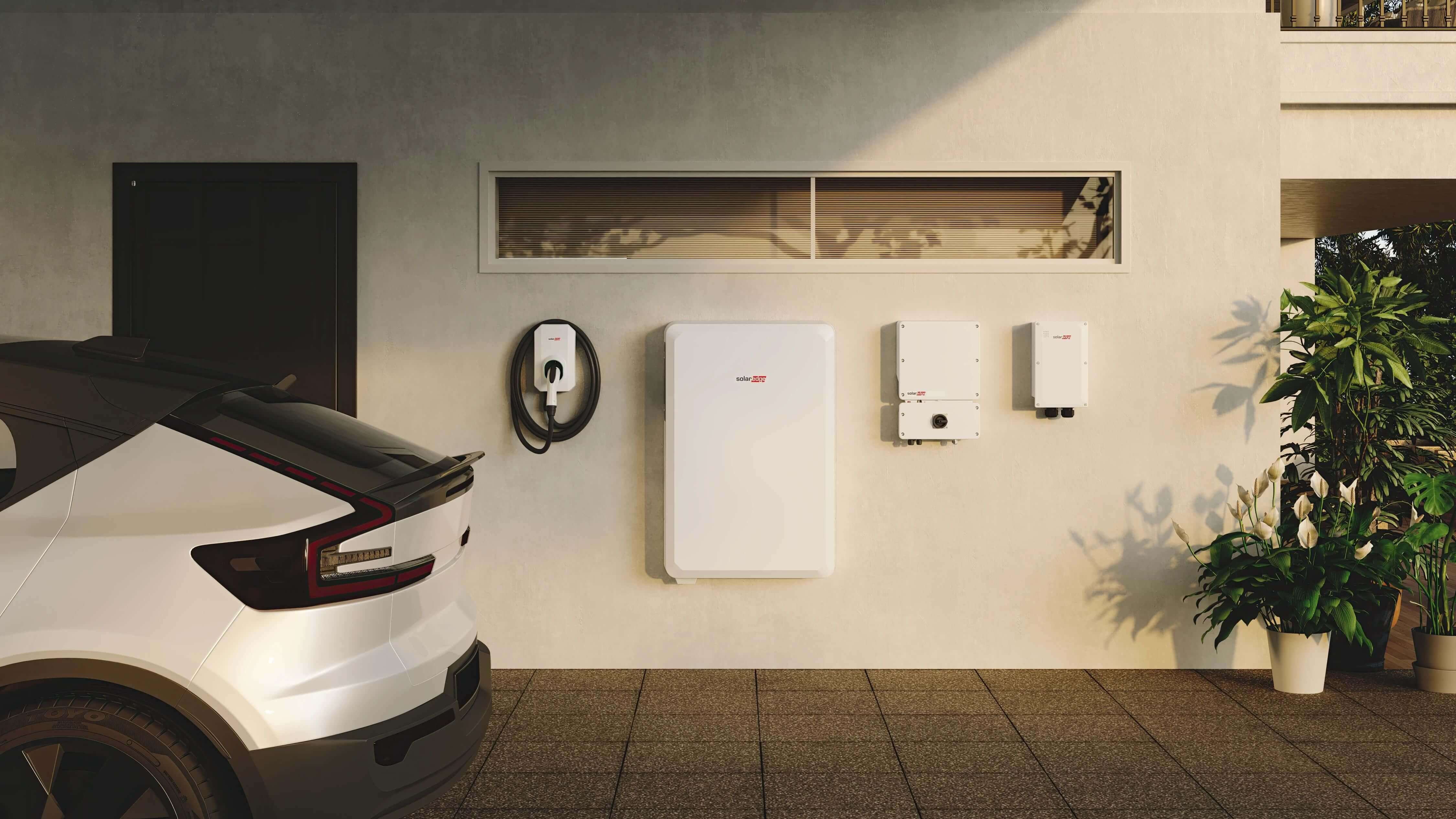 SolarEdge home system with inverter, battery, and EV charger.